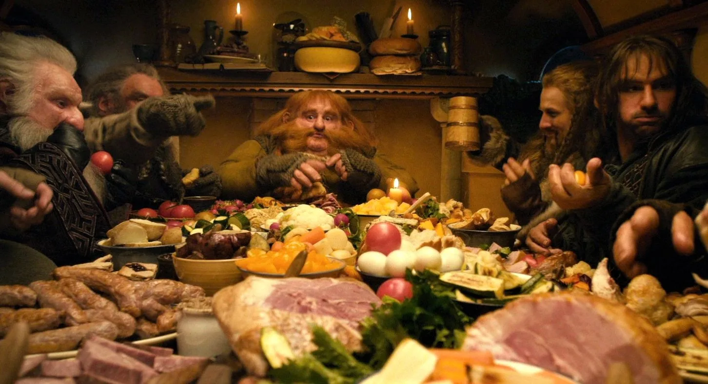 Dwarves eating Bilbo Baggin's food in Bag End in The Hobbit movie