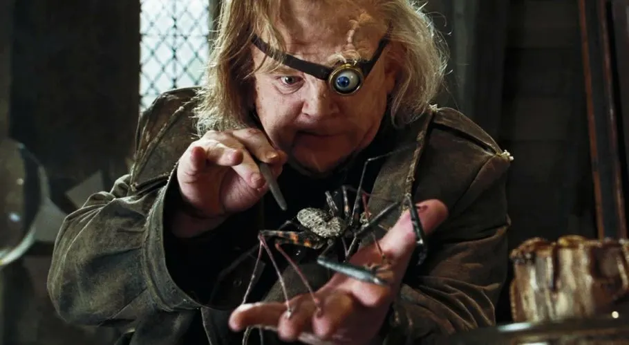 Barty Crouch Jnr as Alastor Moody using the Cruciatus Curse on a spider