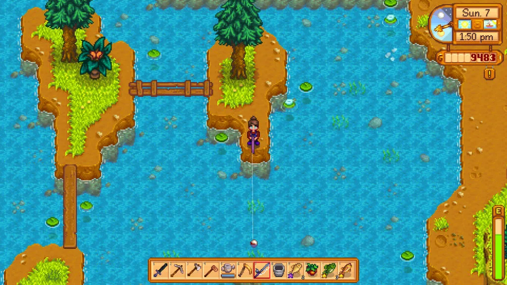 Screenshot of Stardew Valley. The player character stands at the bottom tip of the furthest-right island in the Mountain Lake during the summer. They are fishing.