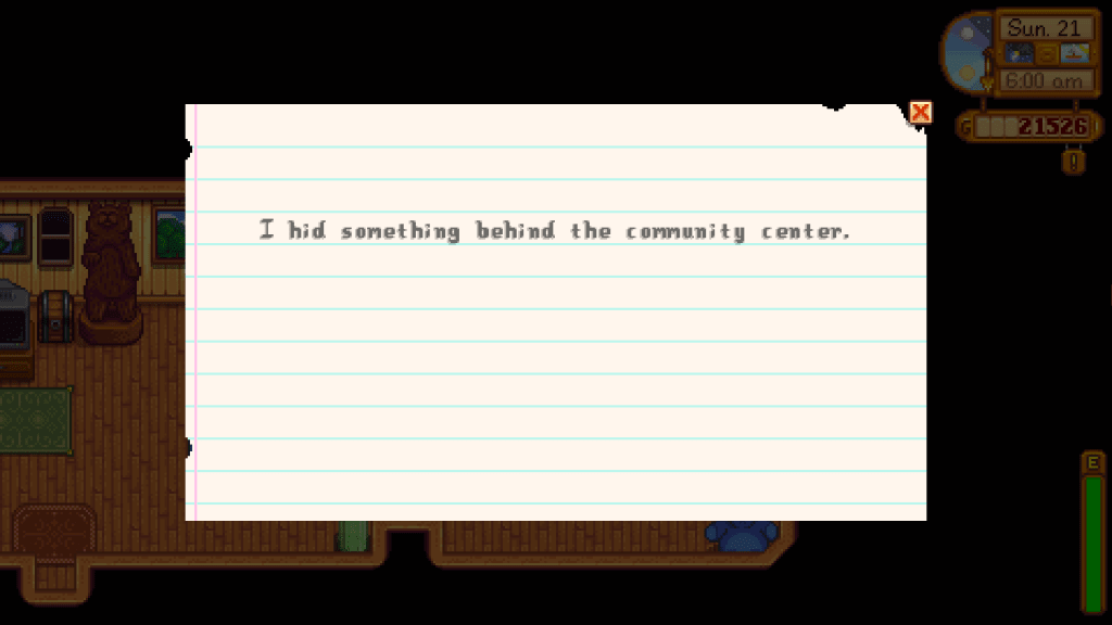 Screenshot of Stardew Valley. Secret Note 14 is open in front of the player's house. It reads: I hid something behind the community center.