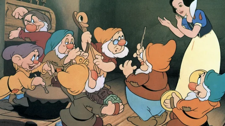 The seven dawrves and Snow White from the Snow White cartoon movie