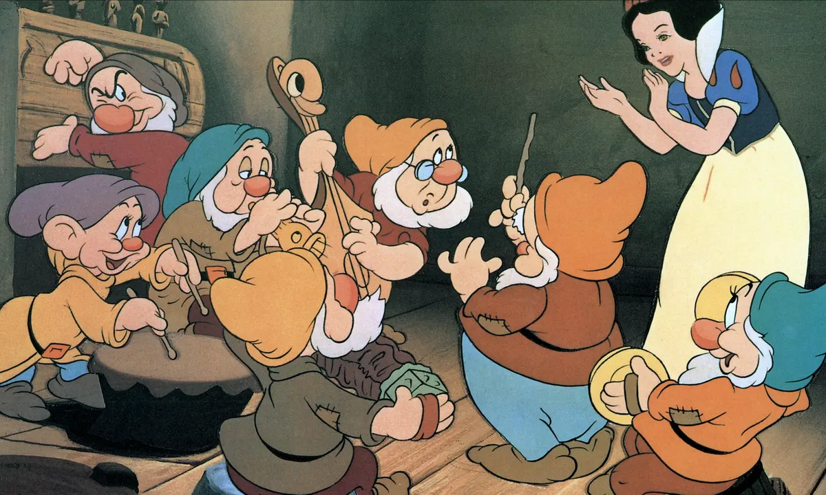 The seven dawrves and Snow White from the Snow White cartoon movie
